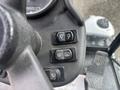 Close-up of the control panel of a 2019 Madvac LS175 with three buttons for lights and defrost settings