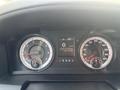 Dashboard of a 2015 RAM 1500 displaying speedometer fuel gauge and warning lights with a digital readout showing 0 km/h and 23 degrees Celsius