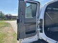 A 2017 Ford F-550 with the driver's side door open showcasing the interior features and seating area