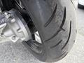 Close-up of the rear tire of a 2016 Yamaha FJR1300AE showcasing its tread pattern and sidewall details
