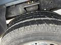 Close-up of a 2006 Dodge Ram 2500 tire showing tread pattern and wear