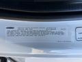 A label detailing vehicle noise emission control information for a 2011 Freightliner M2 106, outlining compliance with regulations for medium and heavy trucks