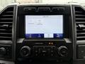 Dashboard of a 2022 Ford F600 featuring a central touchscreen display and various control buttons for audio and settings