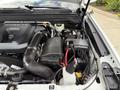 The image shows the engine compartment of a 2017 Chevrolet Colorado featuring a Duramax 28 engine with visible components including air intake and battery