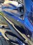 A 2016 Yamaha FJR1300AE motorcycle with a sleek blue body and distinctive angular design