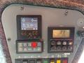 Control panel of a 2018 Sandvik Ranger DX800 featuring digital displays for RPM and temperature alongside various control buttons