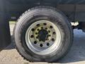 Close-up of a 2022 Lion Lion6 truck tire featuring a Goodyear label with visible tread pattern and metallic rim
