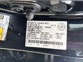 A label on a 2014 Honda CR-V featuring manufacturing information, specifications, and vehicle identification details