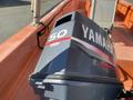 A Yamaha 50 outboard motor mounted on a 2007 Fassmer 20 Foot Fast Rescue Boat