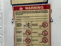 A warning sign with operating instructions for a 2010 Great Dane 45 foot trailer displaying various safety icons and guidelines