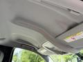 Interior view of the ceiling of a 2016 Chevrolet Silverado 2500HD featuring fabric material and a light fixture