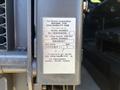 A label attached to a RAM ProMaster 3500 displaying information about the model number, capacity, and manufacturing date