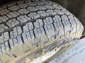 Close-up of the tread on a tire from a 2018 GMC Canyon showing deep grooves and textured surface designed for traction on various terrains