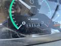 Close-up of a 2011 Case 570 MXT tachometer showing engine RPM up to 3000 with odometer reading 133218