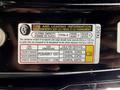 A tire and loading information label for a 2014 Honda Odyssey listing seating capacity tire sizes and pressure recommendations
