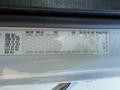 A data sticker from a 2011 Freightliner M2 106 displaying axle weight limits tire sizes and rim specifications