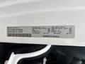 2023 RAM Promaster 3500 with a label detailing manufacturing information and vehicle specifications including weight ratings and vehicle identification number