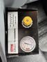 A control panel featuring a gauge and a yellow adjustment knob labeled for liftable suspensions
