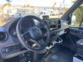 Interior view of a 2021 Mercedes-Benz Sprinter 2500 with a steering wheel dashboard and control panel visible