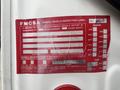 Red FMCSA annual vehicle inspection label attached to a 2006 Freightliner M2 106 with fields for vehicle information and inspection dates