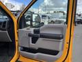 Interior view of the driver's side door of a 2017 Ford F-250 SD featuring a gray panel with a black handle and controls for windows and locks