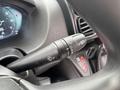 Close-up of the windshield wiper control lever inside a 2023 RAM Promaster 3500 showing various settings for wipers and washers