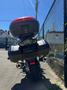 A 2016 Yamaha FJR1300AE motorcycle with a sleek design featuring a rear trunk and side panniers ready for a ride