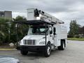 A white 2021 Freightliner M2 106 bucket truck equipped with a hydraulic lift mounted on the top and storage compartments on the sides