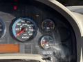 Dashboard of a 2010 International 4300 showing speedometer tachometer voltmeter and fuel gauge