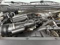 Close-up view of the engine of a 2020 Ford F-550 highlighting the air intake and various interconnected components