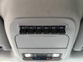 A ceiling control panel with six auxiliary switches labeled AUX 1 through AUX 6 in a 2023 Ford F-450 Super Duty