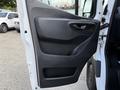 A 2021 Mercedes-Benz Sprinter van door featuring a sleek black panel design with a handle and an armrest area