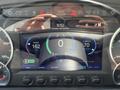 A digital display panel showing vehicle metrics including range average speed battery charge and settings for a 2022 Lion Lion6