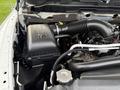 Close-up of the engine compartment of a 2013 RAM 3500 showing the air intake and various components of the engine assembly