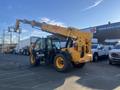 A yellow 2013 JCB 510-56 Loadall with a telescopic arm and large tires positioned for lifting heavy loads