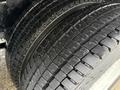 Close-up of a tire from a 2020 International MV607 showcasing the tread pattern and grooves on the rubber surface