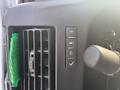 The interior controls of a 2021 Chevrolet Express featuring buttons for headlights and a ventilation system with an air vent