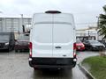 White 2020 Ford Transit van viewed from the rear with no visible branding or graphics