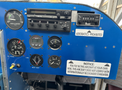 Interior cockpit of a 1986 Sorrell Hiperbipe SNS-7 Amateur-Built Aircraft featuring various gauges switches and a radio panel
