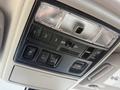 Interior overhead console of a 2021 Toyota 4Runner featuring multiple control buttons for lights and systems