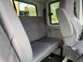 Interior seating of a 2011 International 4300 with grey fabric upholstery showing two seats in a row
