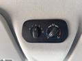 Temperature control knob with settings for fan speed and airflow direction in a 2016 Ford Transit 150