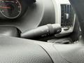 Close-up of the turn signal and windshield wiper control stalk in a 2020 RAM Promaster interior