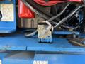 Close-up of a mechanical switch on the control panel of a 2012 Genie Z 45/25 aerial lift with visible wires and components attached