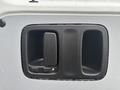 A close-up view of the door handle and lock mechanism on a 2021 Mercedes-Benz Metris van