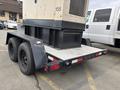 A 2005 Katolight SED60FPJ4 generator mounted on a trailer with two black tires visible and a diamond plate storage area below the generator