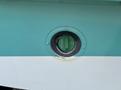 A diesel fuel cap with a green label reading DIESEL on a 2020 Freightliner MT45