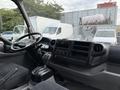 Interior view of a 2020 Hino 195 with a steering wheel gear shift and dashboard controls