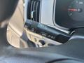 A close-up of the multifunctional control stalk in a 2017 Chevrolet Colorado featuring buttons for menu settings and other functions
