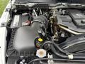 Close-up view of the engine compartment of a 2008 Sterling Bullet showcasing the air intake system and various engine components